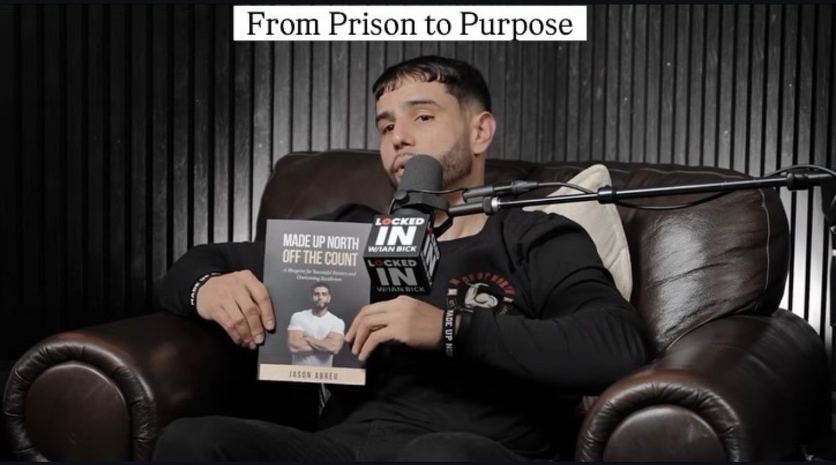 Jason Abreu holding his book during a podcast interview
