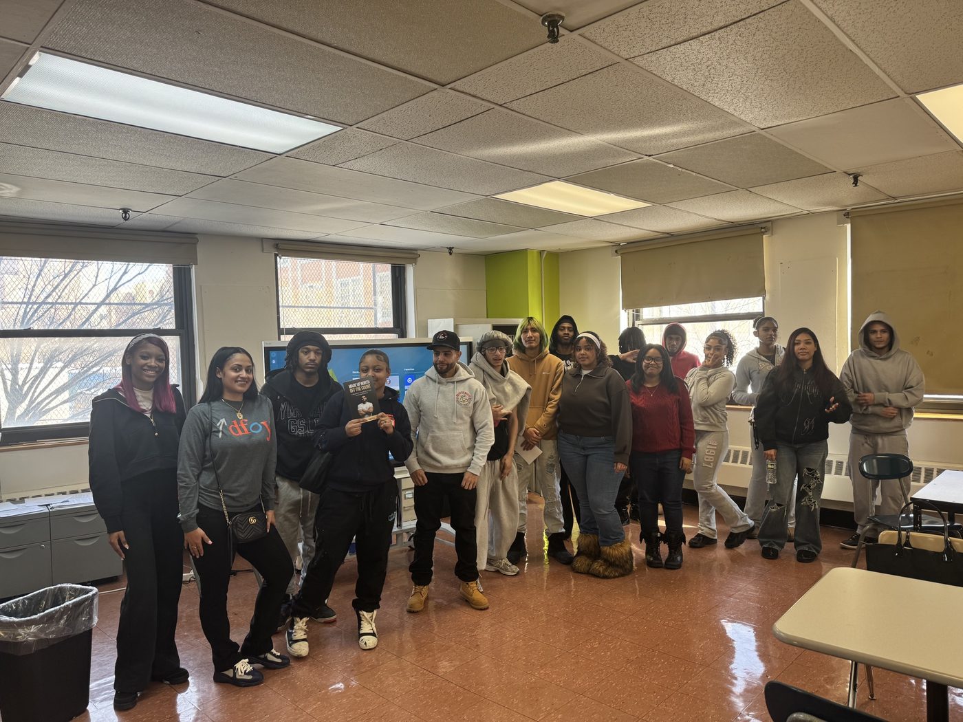 A full classroom of students after completing a session